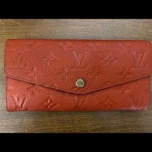 Sold ! Louis Vuitton Red Empreinte Leather Wallet